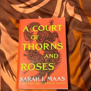 A Court of Thorns and Roses — Orange Paperback by